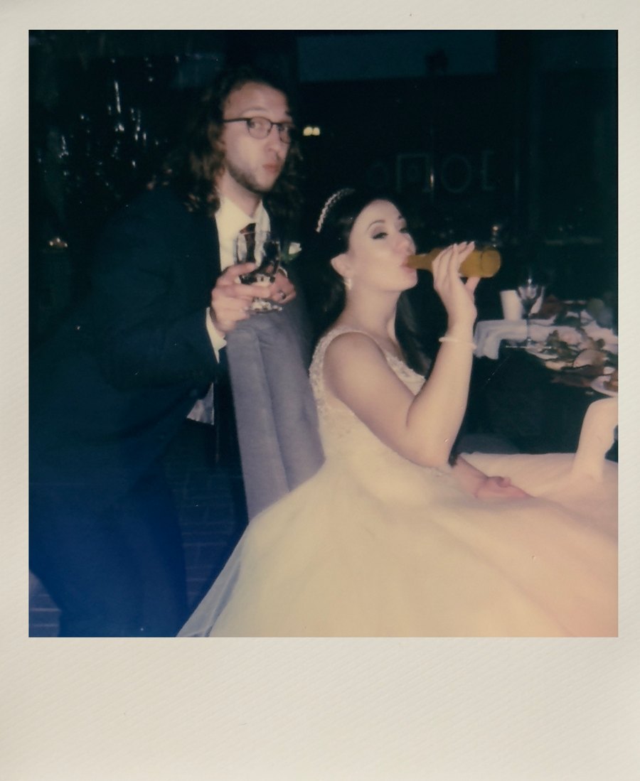 Instant photo of guests celebrating on the dance floor